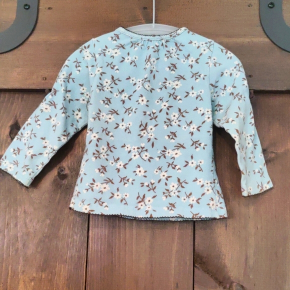 One Kid, Girls Blue Long Sleeve Shirt with White and Brown Flowers - Picture 6 of 6